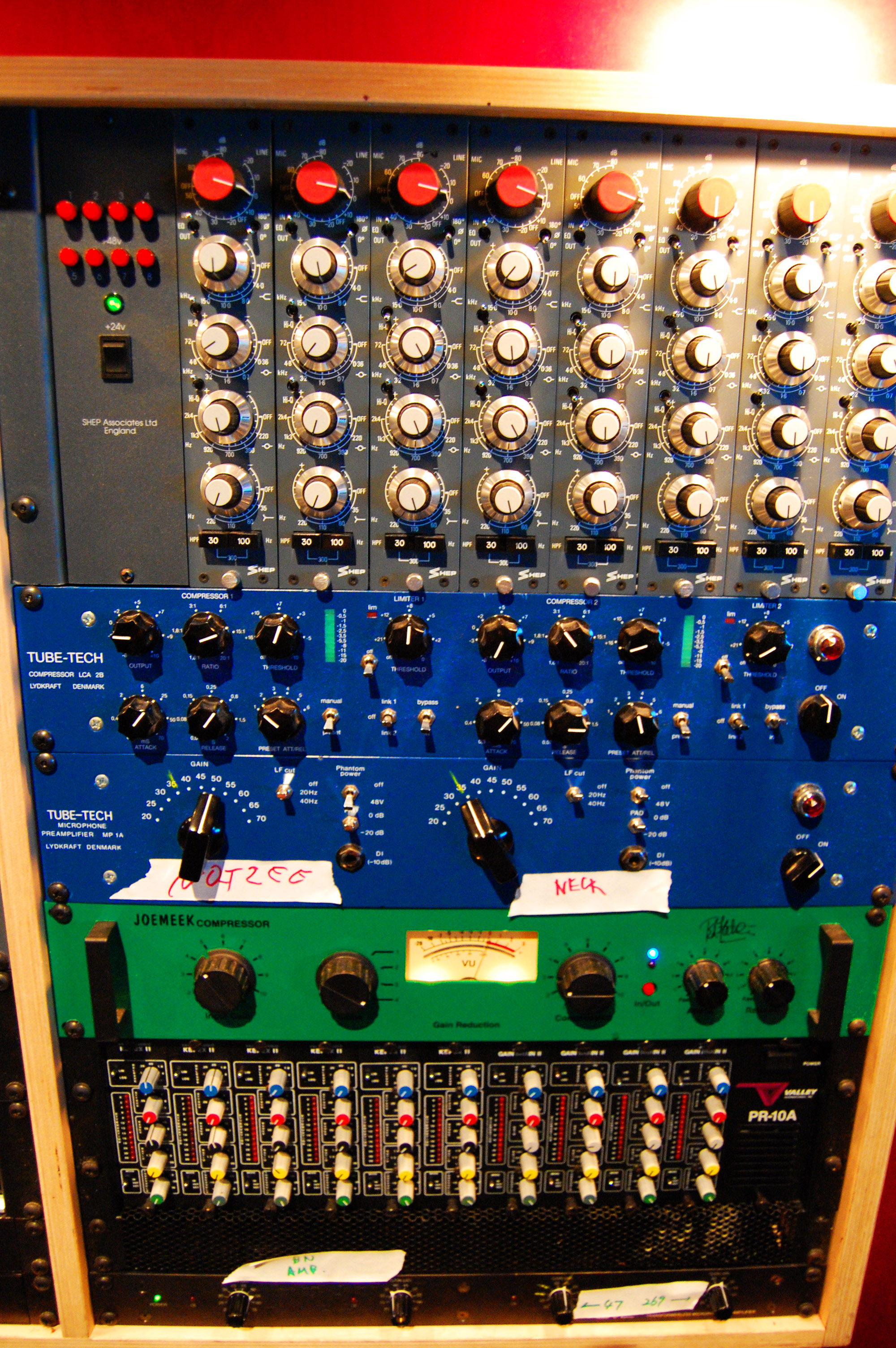 Rack with 1073 style preamps and Tube Tech outboard in a studio