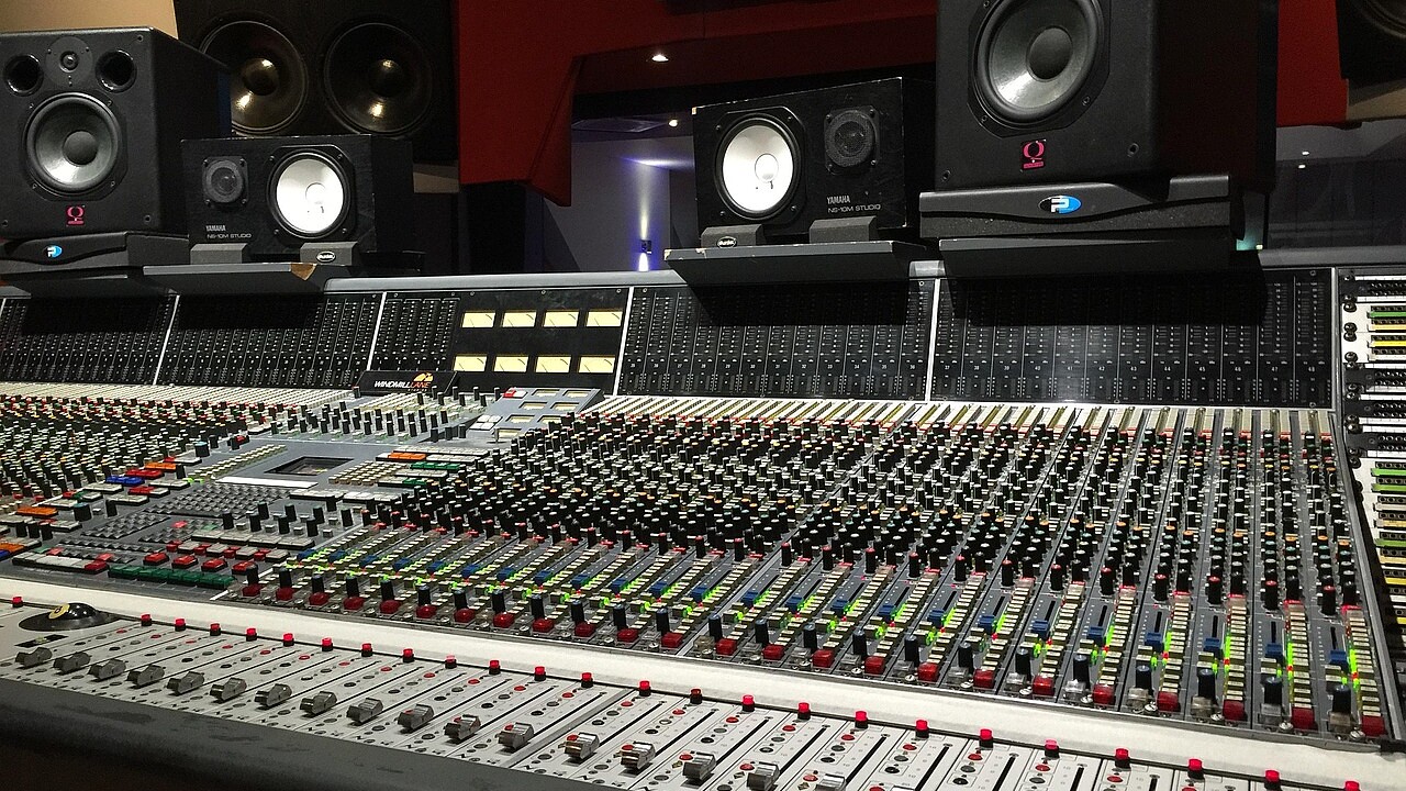 Close up of faders on a mixing console